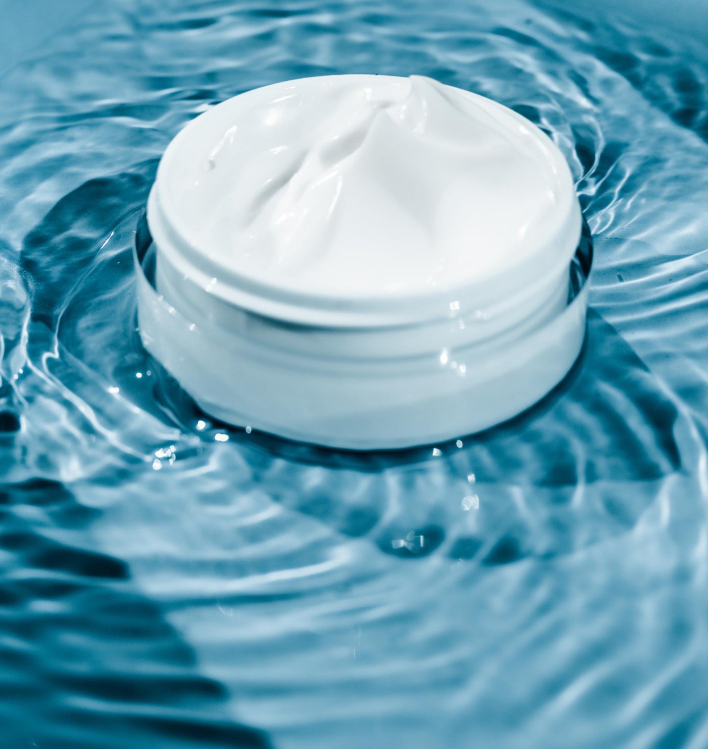 jar of hydrating organic face cream for sensitive skin